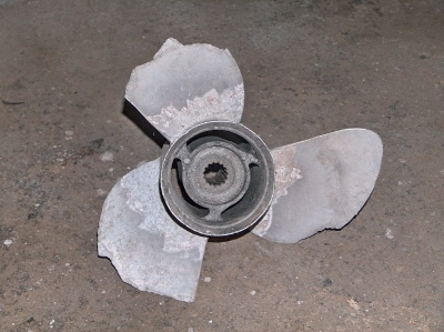 Damaged boat propeller before repair